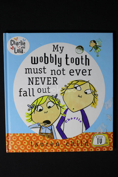 Charlie and Lola: My Wobbly Tooth Must Not Ever Never Fall Out