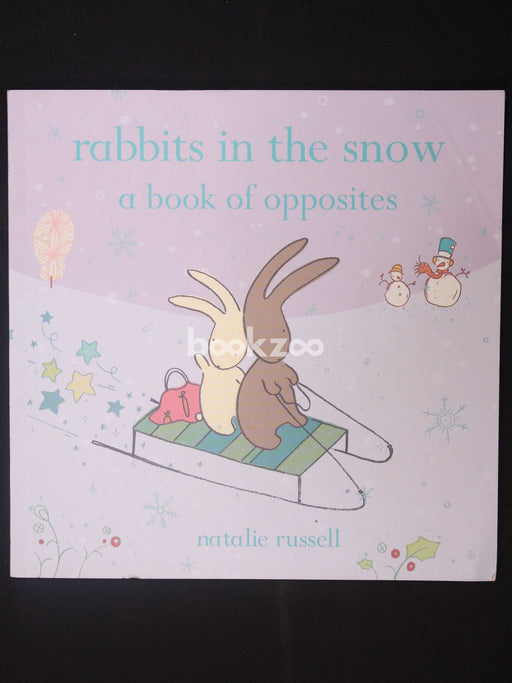 Rabbits in the snow a book of opposites